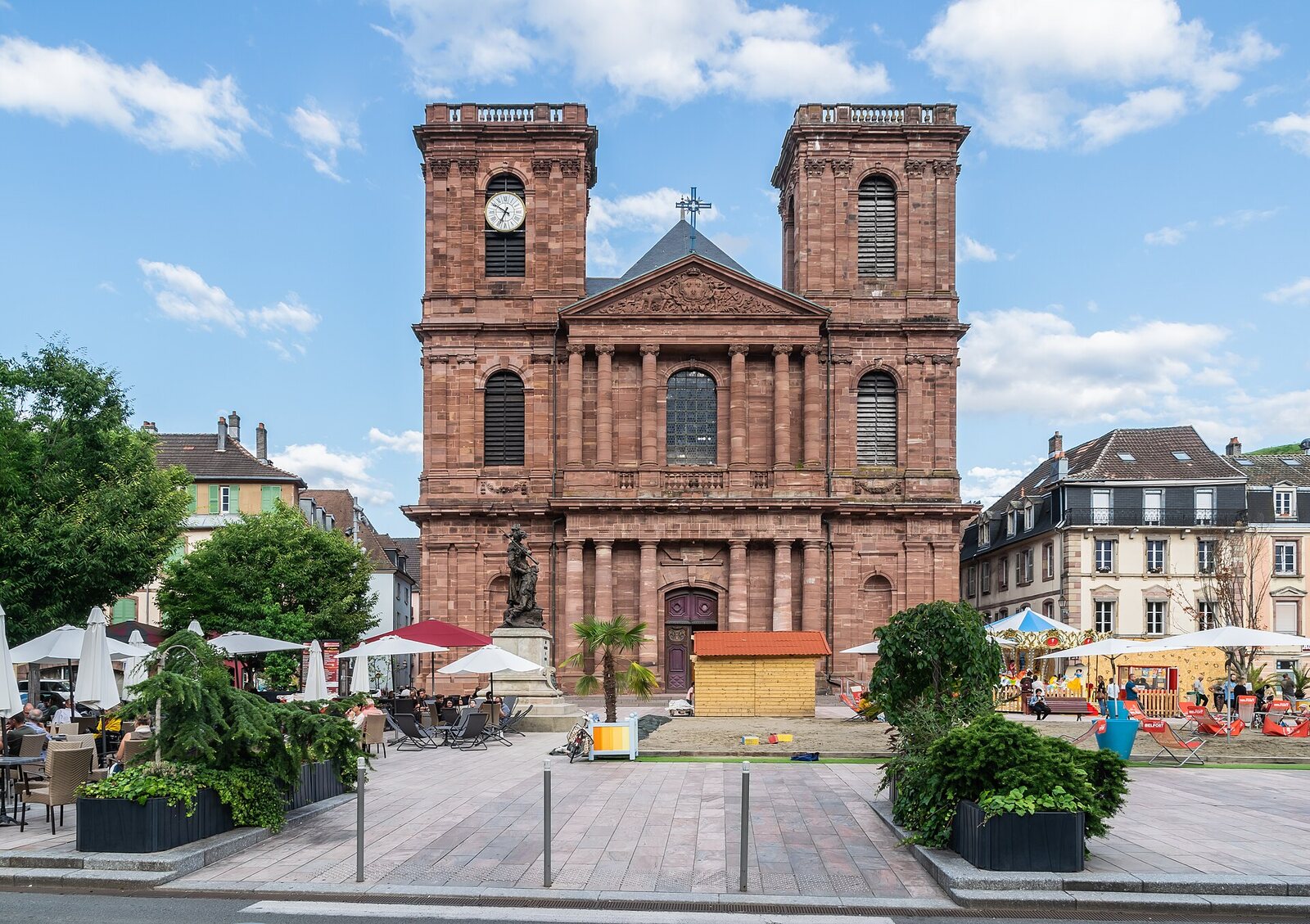 The Place d’Armes in Belfort, with Saint-Christophe cathedral and its café terraces